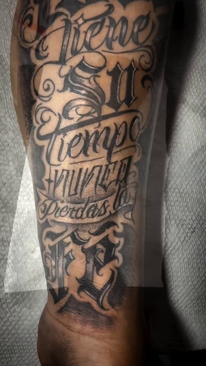 Tattoo by @jonny_vicious_tattoer — lettering_script, black_and_grey