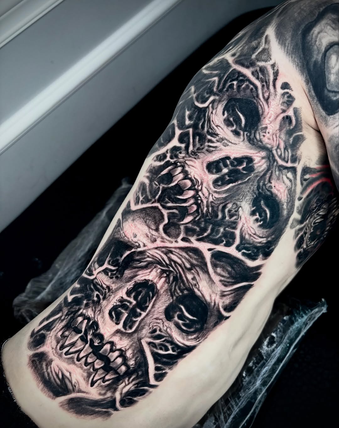 Tattoo by @blaggy__black — realism, black_and_grey