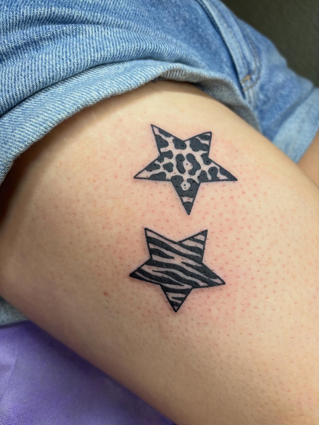 Tattoo by @malia_tattoos — illustrative, blackwork