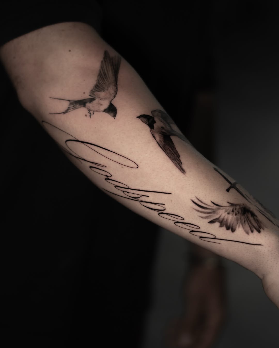 Tattoo by @ron.alvarez_tattoo — lettering_script, black_and_grey