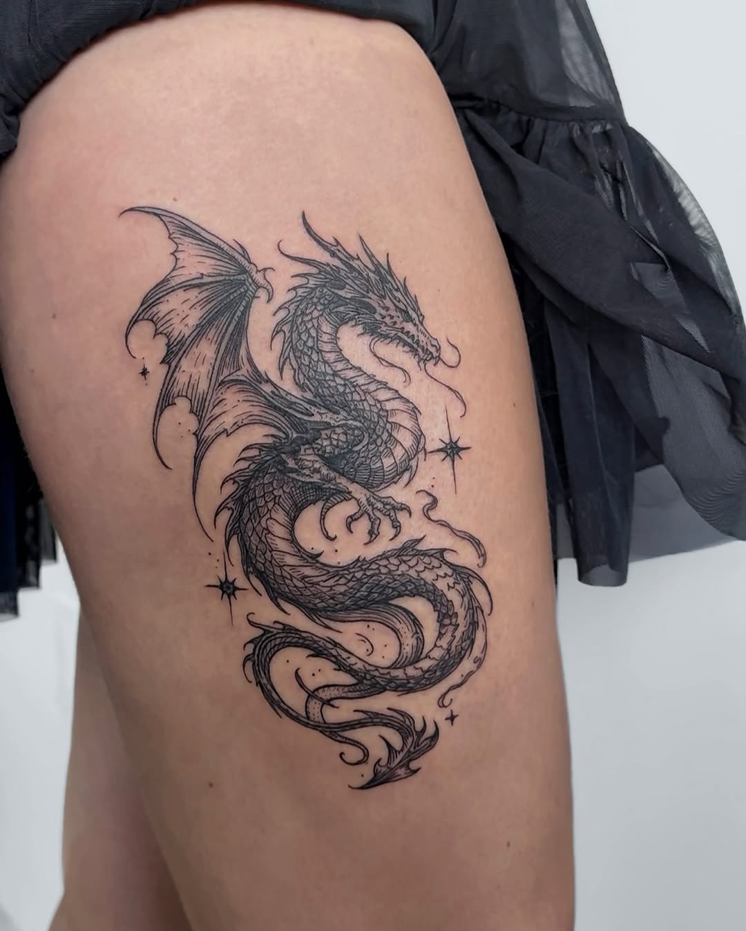 Tattoo by @ruby.tats — black_and_grey, illustrative