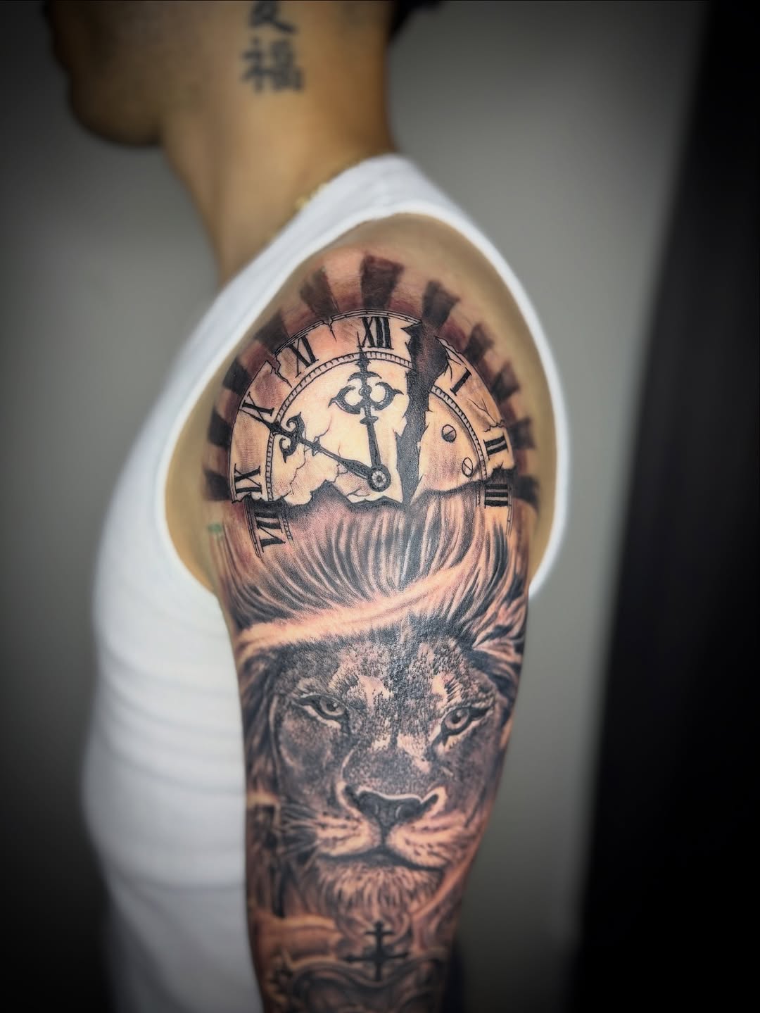 Tattoo by @zhentats2 β realism, black_and_grey