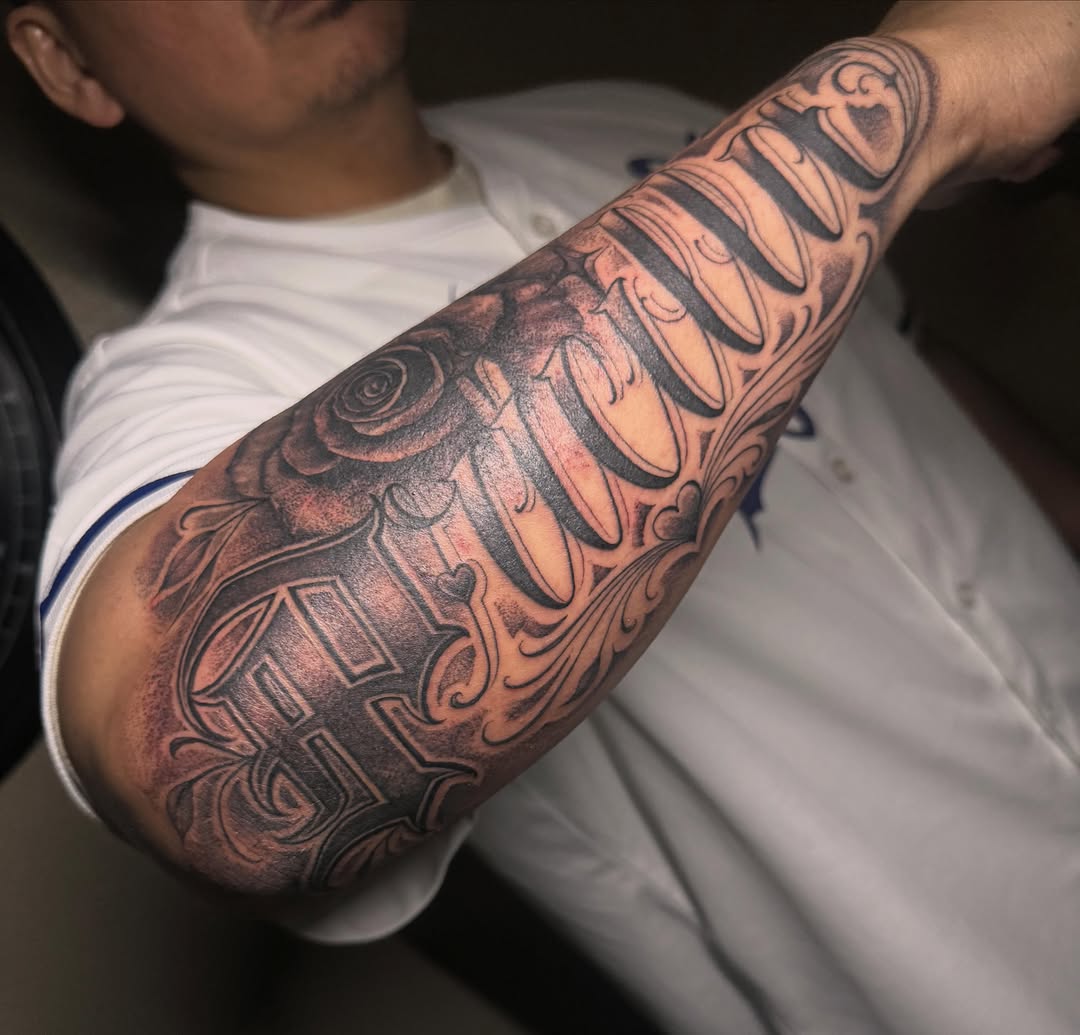 Tattoo by @cesarbee — lettering_script, black_and_grey