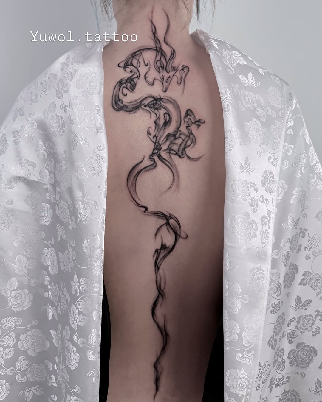 Tattoo by @yuwol.tattoo — black_and_grey, illustrative