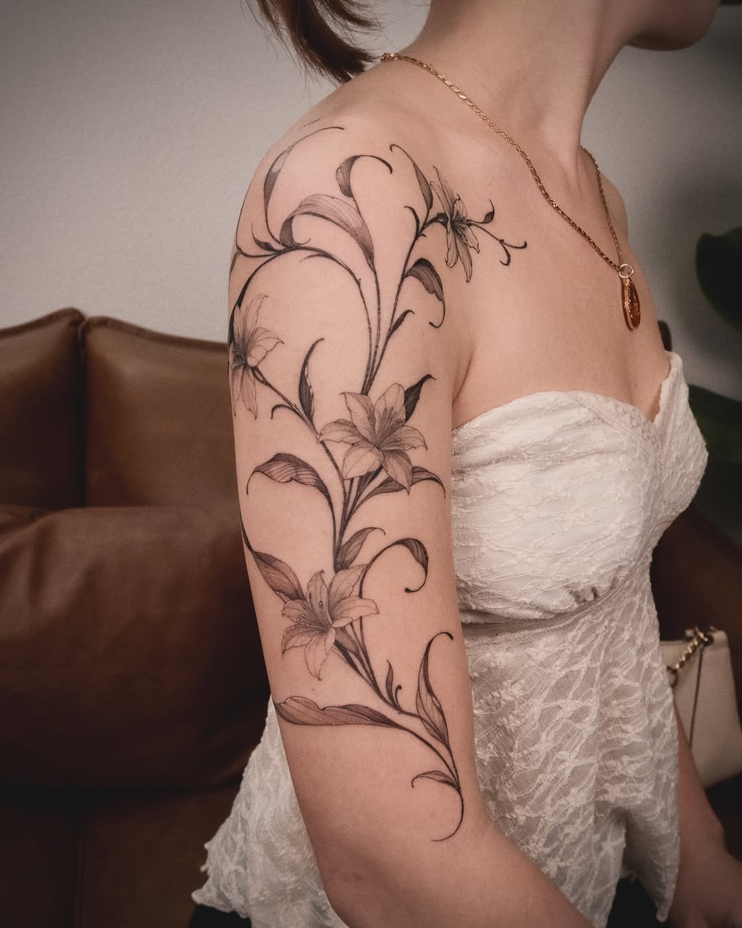 Tattoo by @wong_tattooer — fine_line, black_and_grey
