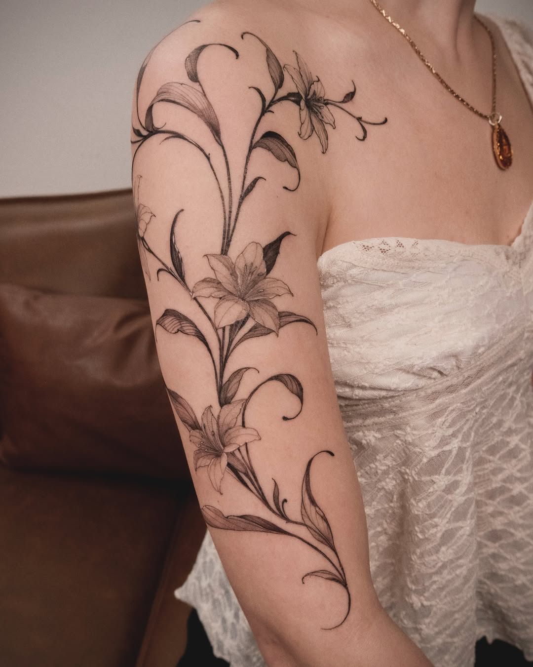 Tattoo by @wong_tattooer — fine_line, black_and_grey