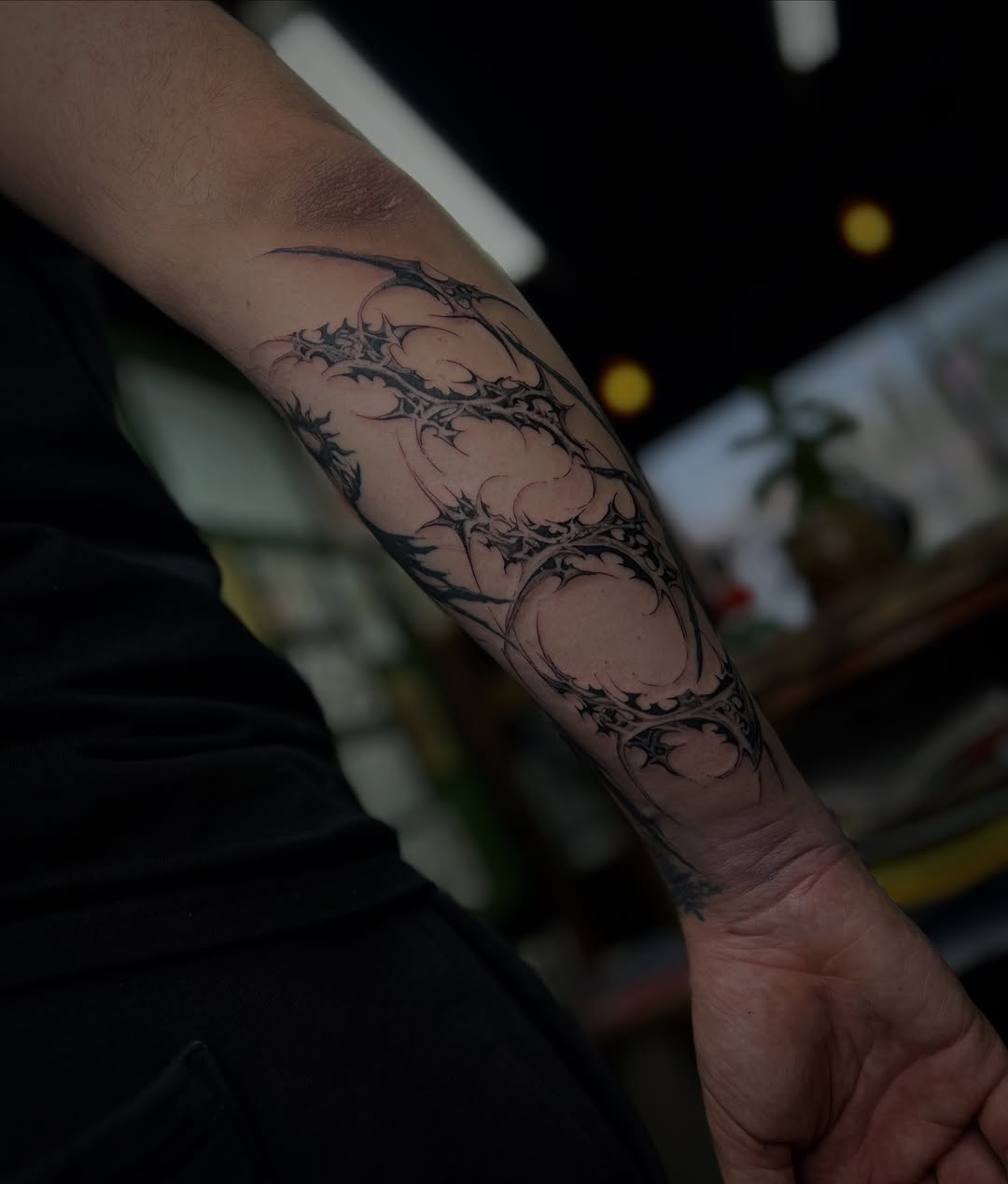Tattoo by @entity.ttt — blackwork, geometric
