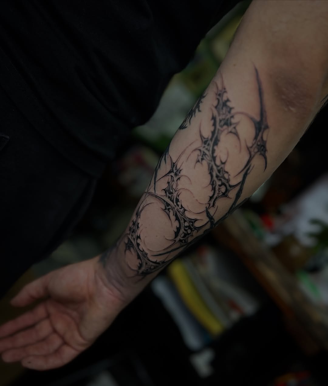 Tattoo by @entity.ttt — blackwork, geometric