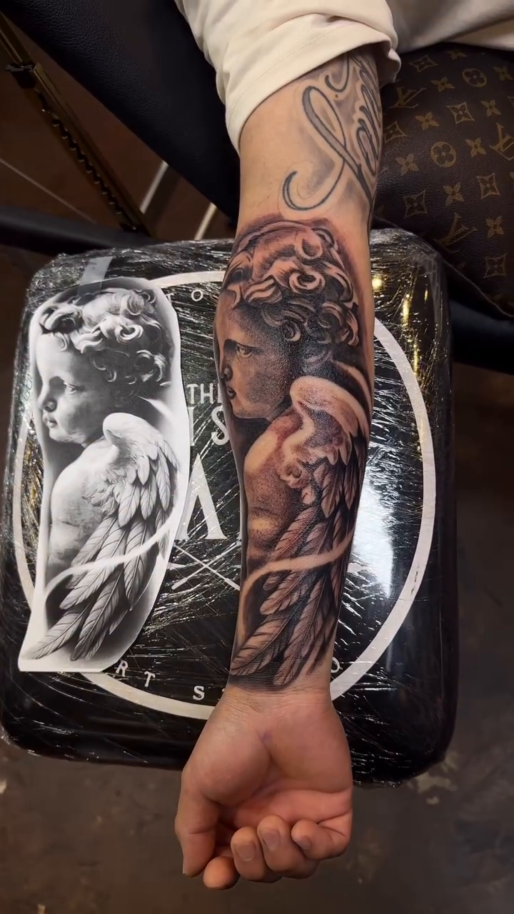 Tattoo by @inkzombi — black_and_grey, realism