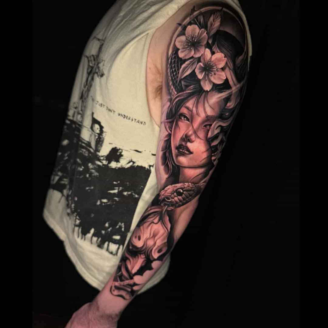 Tattoo by @_snacksy — realism, black_and_grey