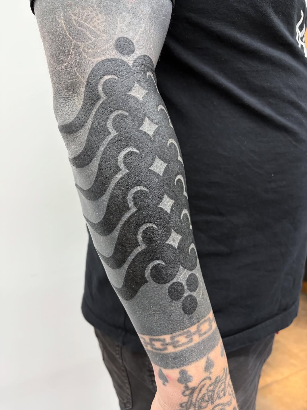 Tattoo by @slime.time.live — blackwork, geometric
