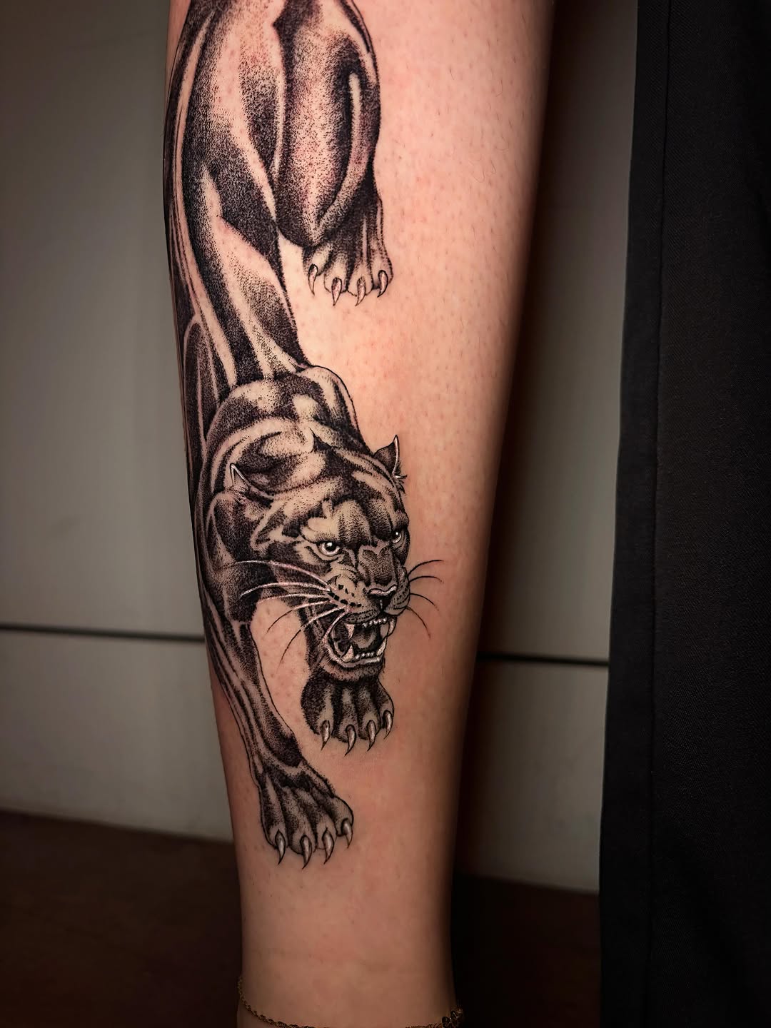 Tattoo by @liz.tattooz — blackwork, realism