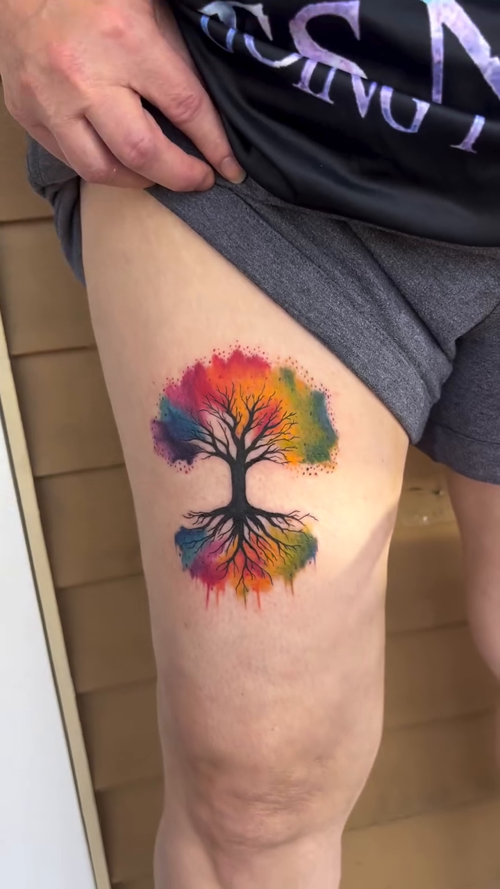 Tattoo by @jaiwoods_tattoo — watercolor