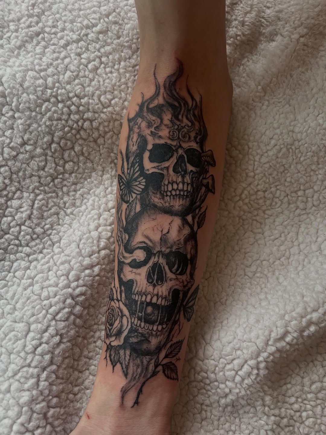 Tattoo by @tattedupbaddies_ — dark_realism, black_and_grey
