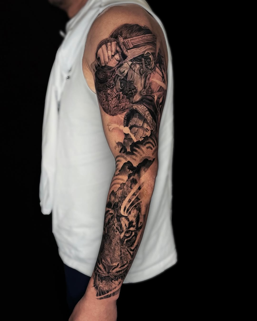 Tattoo by @leo.tattooatl — realism, black_and_grey