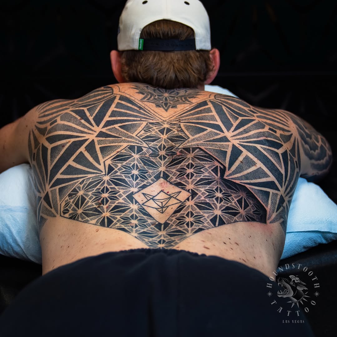 Tattoo by @sacredhound.ttt — geometric, dotwork