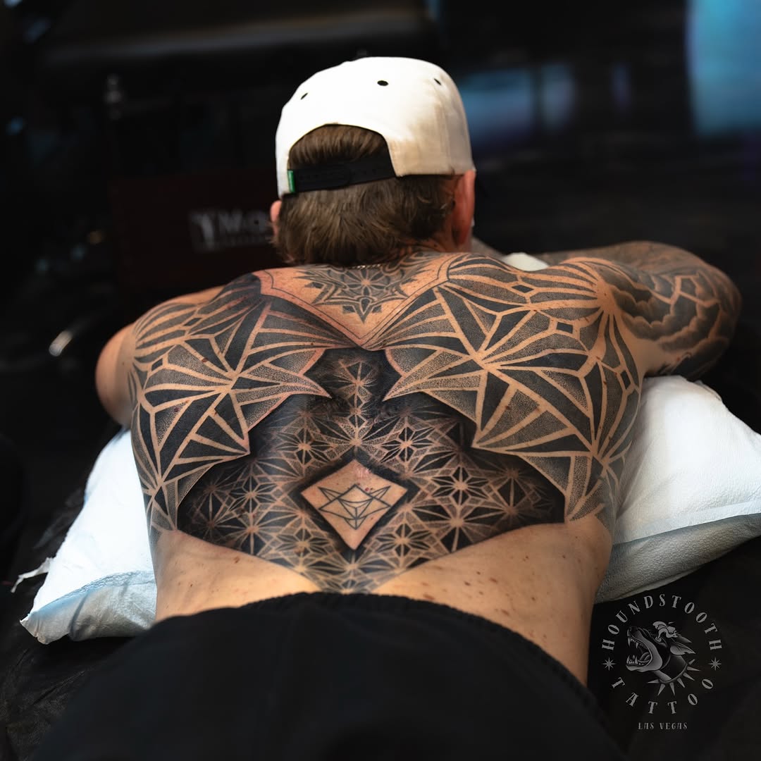 Tattoo by @sacredhound.ttt — geometric, dotwork