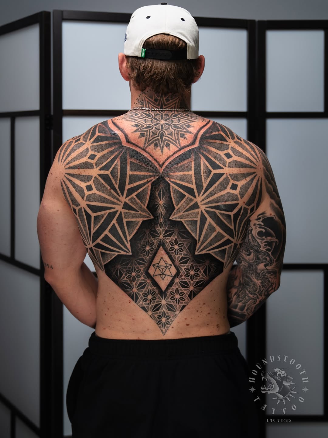 Tattoo by @sacredhound.ttt — geometric, dotwork