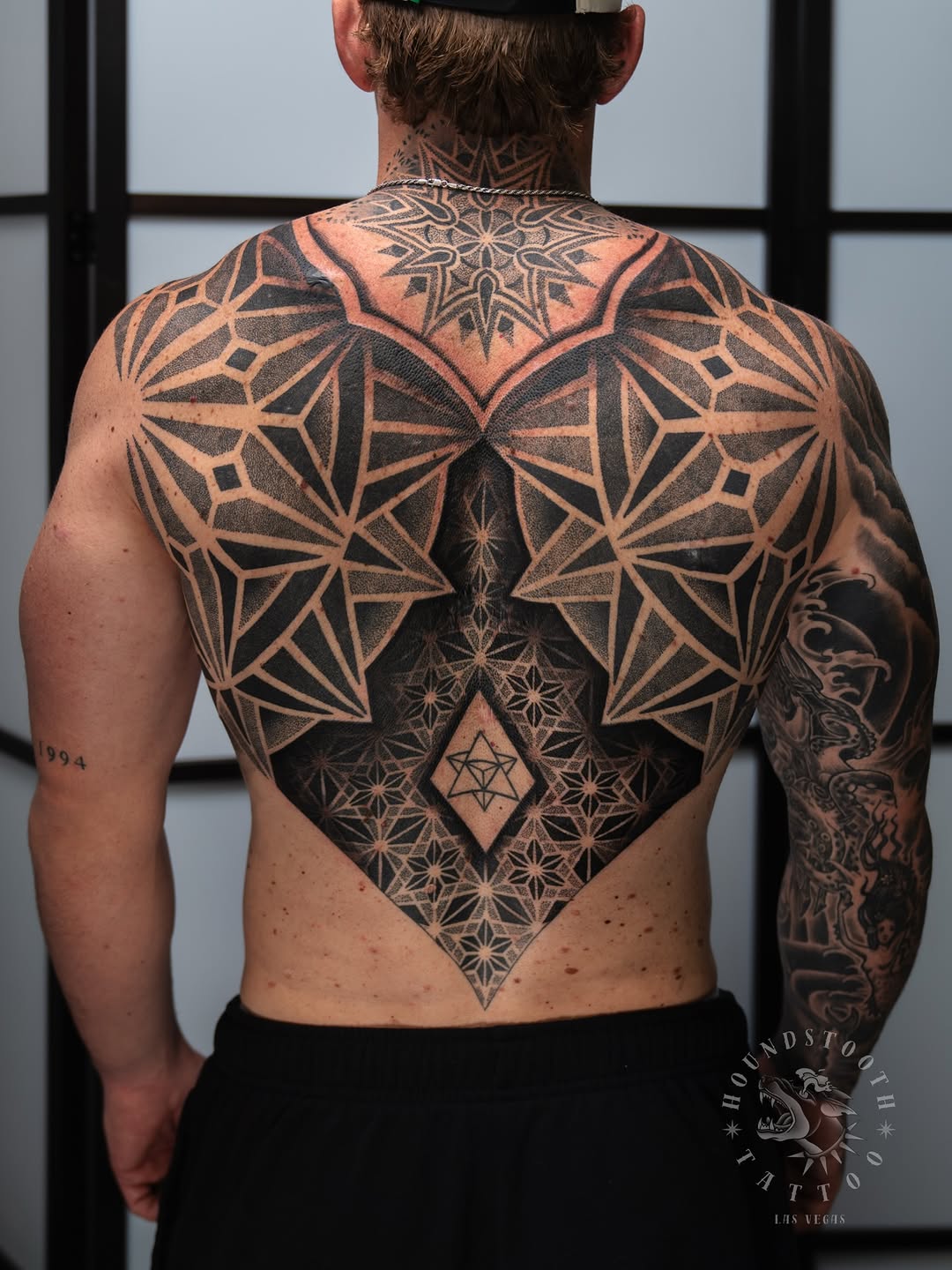 Tattoo by @sacredhound.ttt — geometric, dotwork