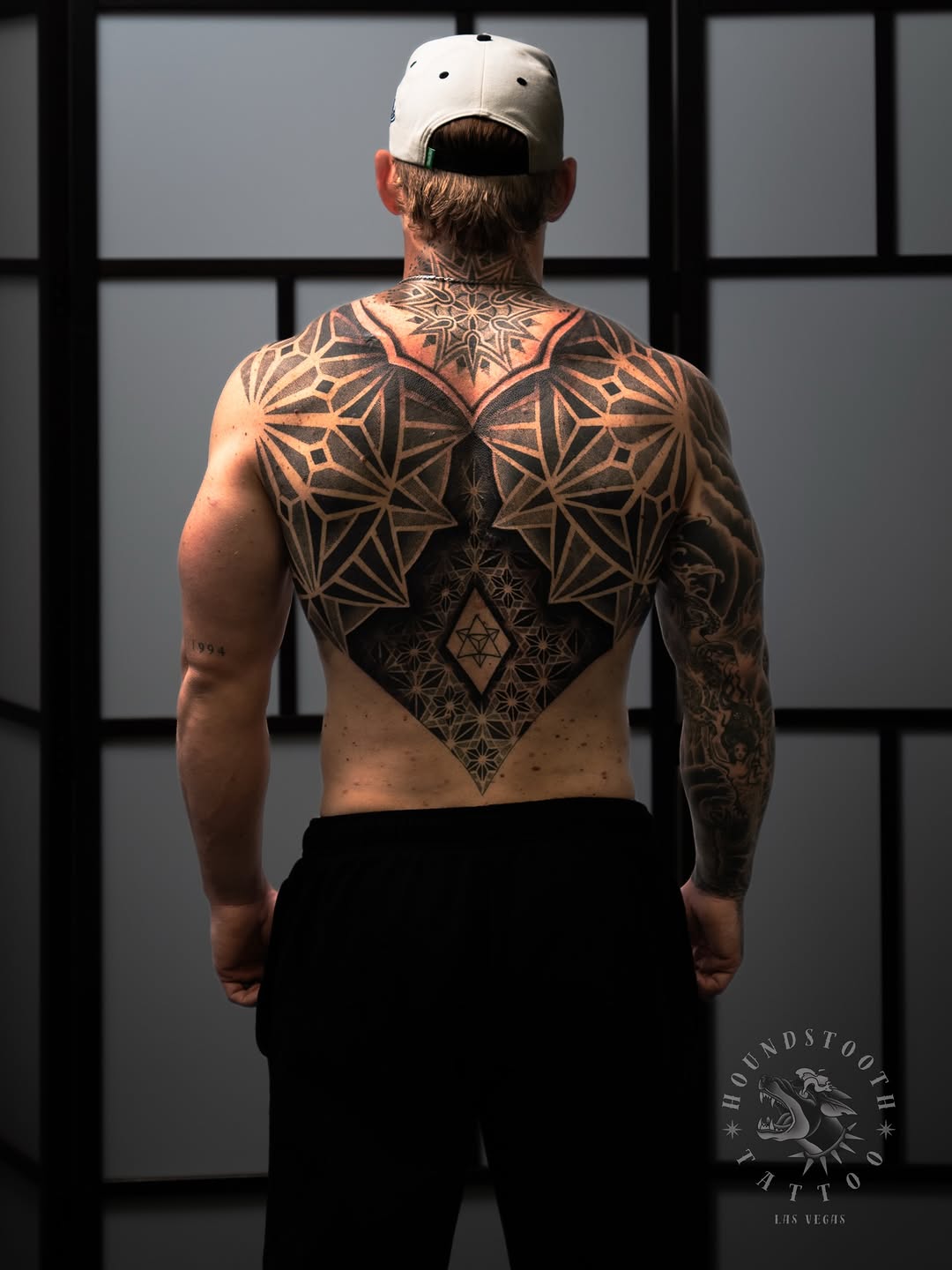 Tattoo by @sacredhound.ttt — geometric, dotwork