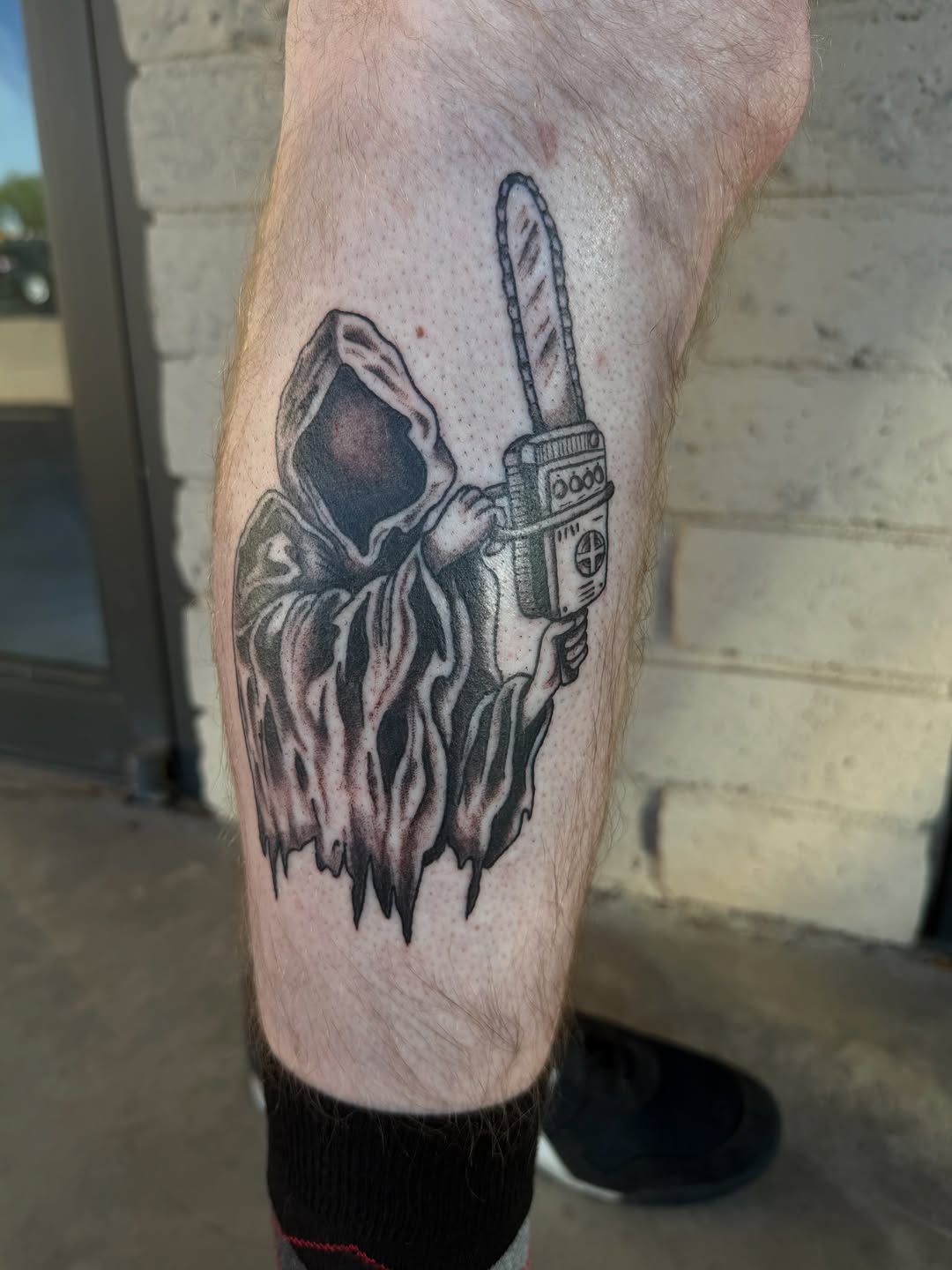 Tattoo by @kaylaj_tattoos — dark_realism, black_and_grey
