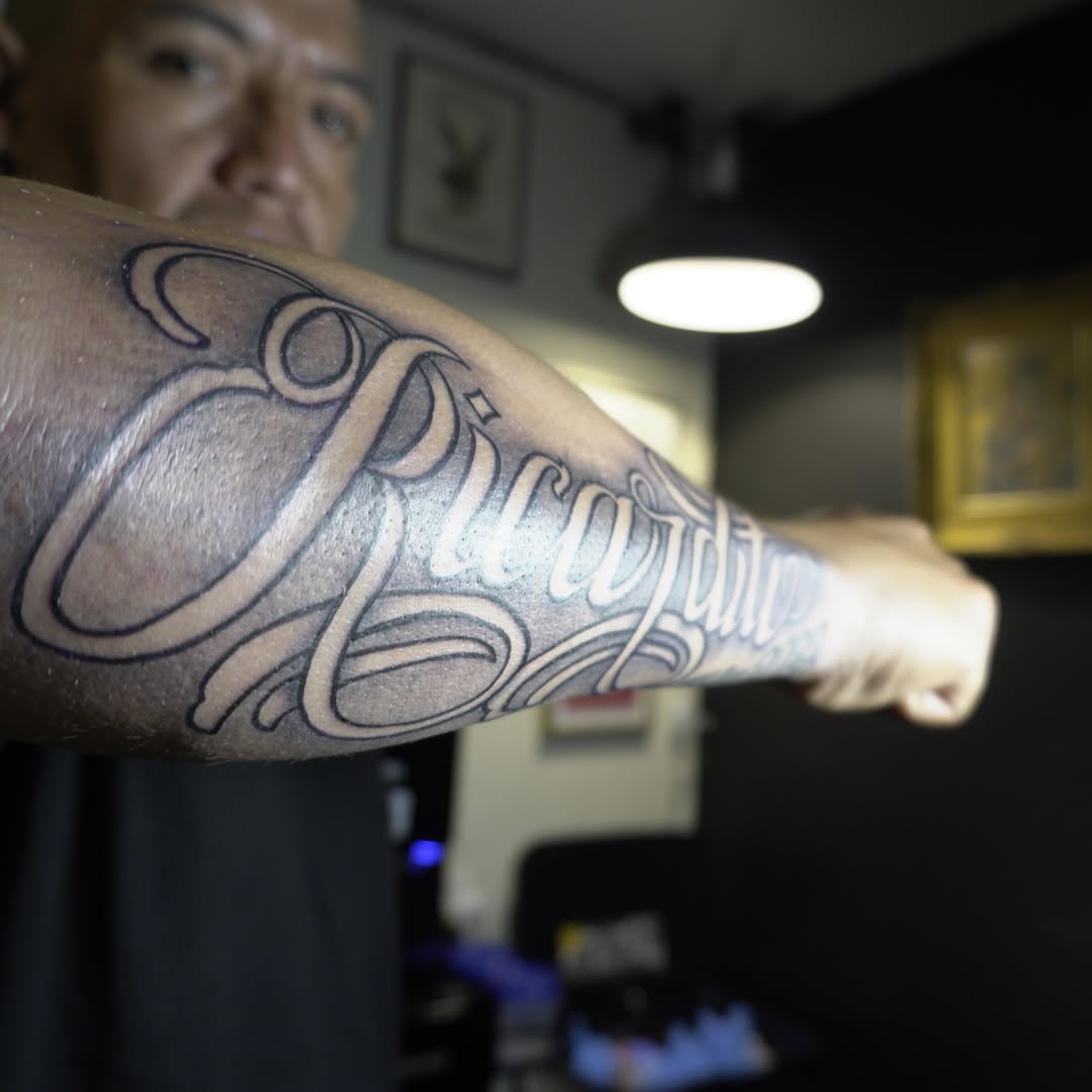 Tattoo by @adrian__tattoos — lettering_script, chicano