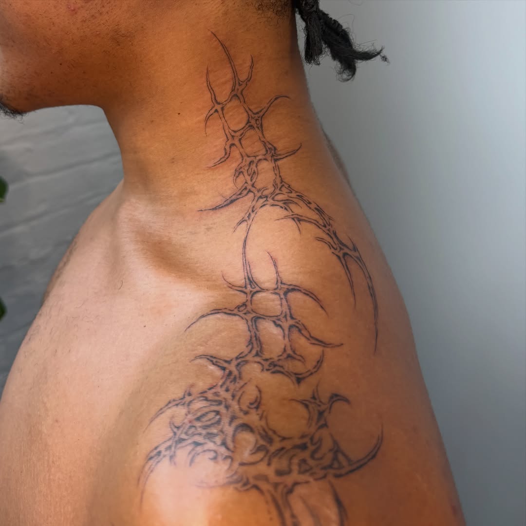 Tattoo by @fairygodfather.ink — blackwork, ornamental
