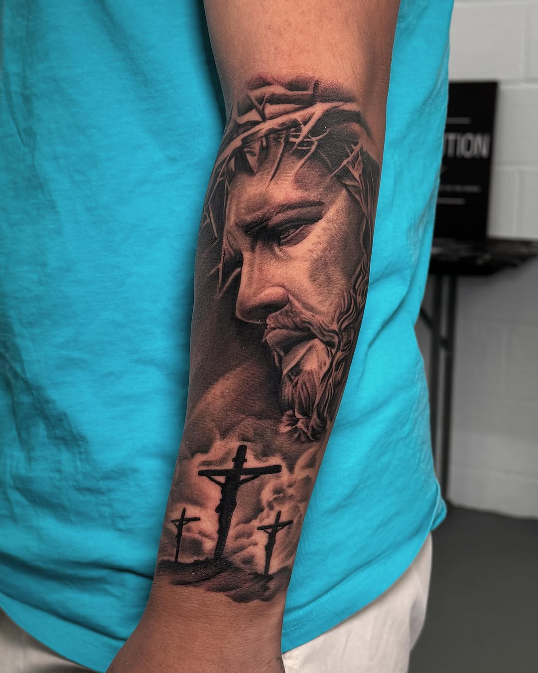 Tattoo by @grineylagantattoo — realism, black_and_grey