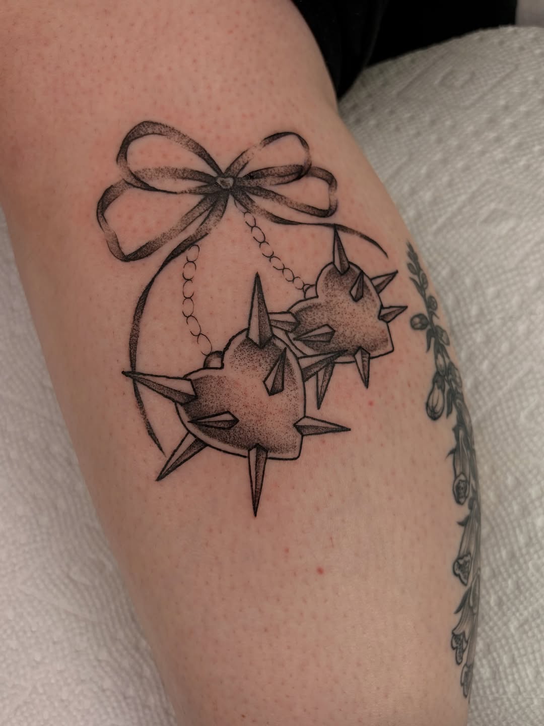 Tattoo by @marticia.tats — illustrative, dotwork