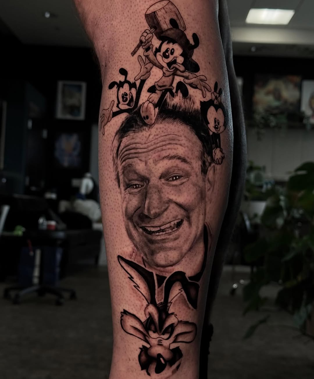 Tattoo by @weaponized_onion โ realism, black_and_grey
