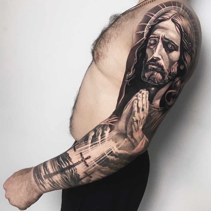 Tattoo by @vudi_tattoo — realism, black_and_grey