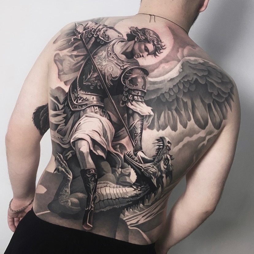Tattoo by @vudi_tattoo — realism, black_and_grey