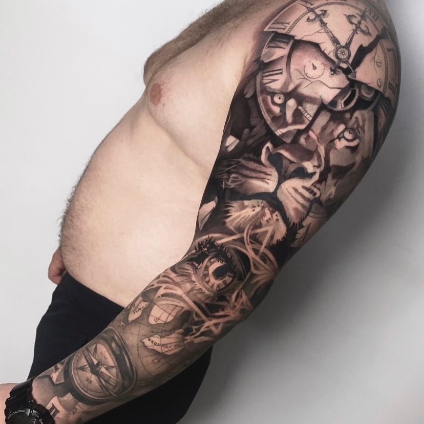 Tattoo by @vudi_tattoo — realism, black_and_grey