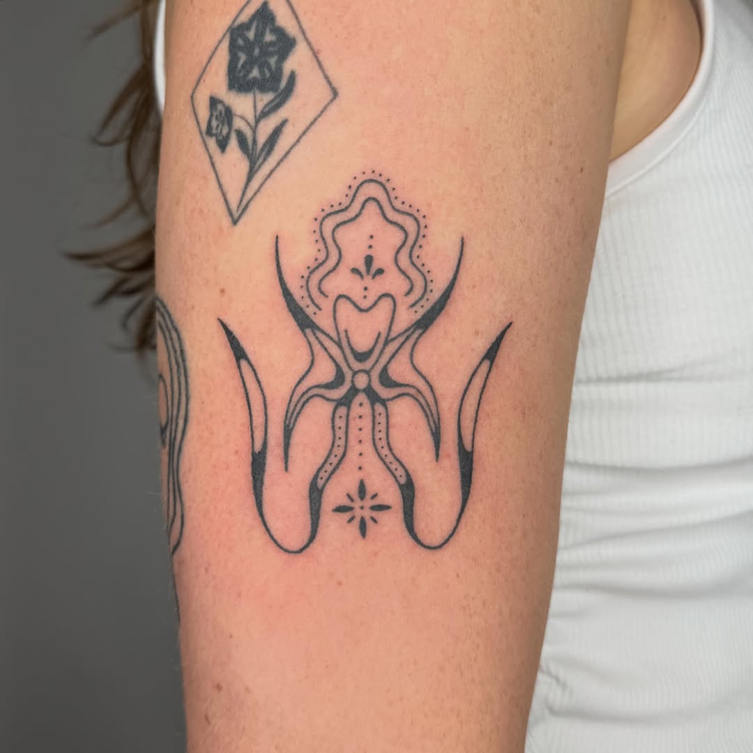 Tattoo by @microwave.00 — fine_line, ornamental