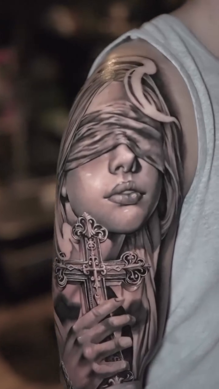 Tattoo by @mickeytattoos — realism, black_and_grey