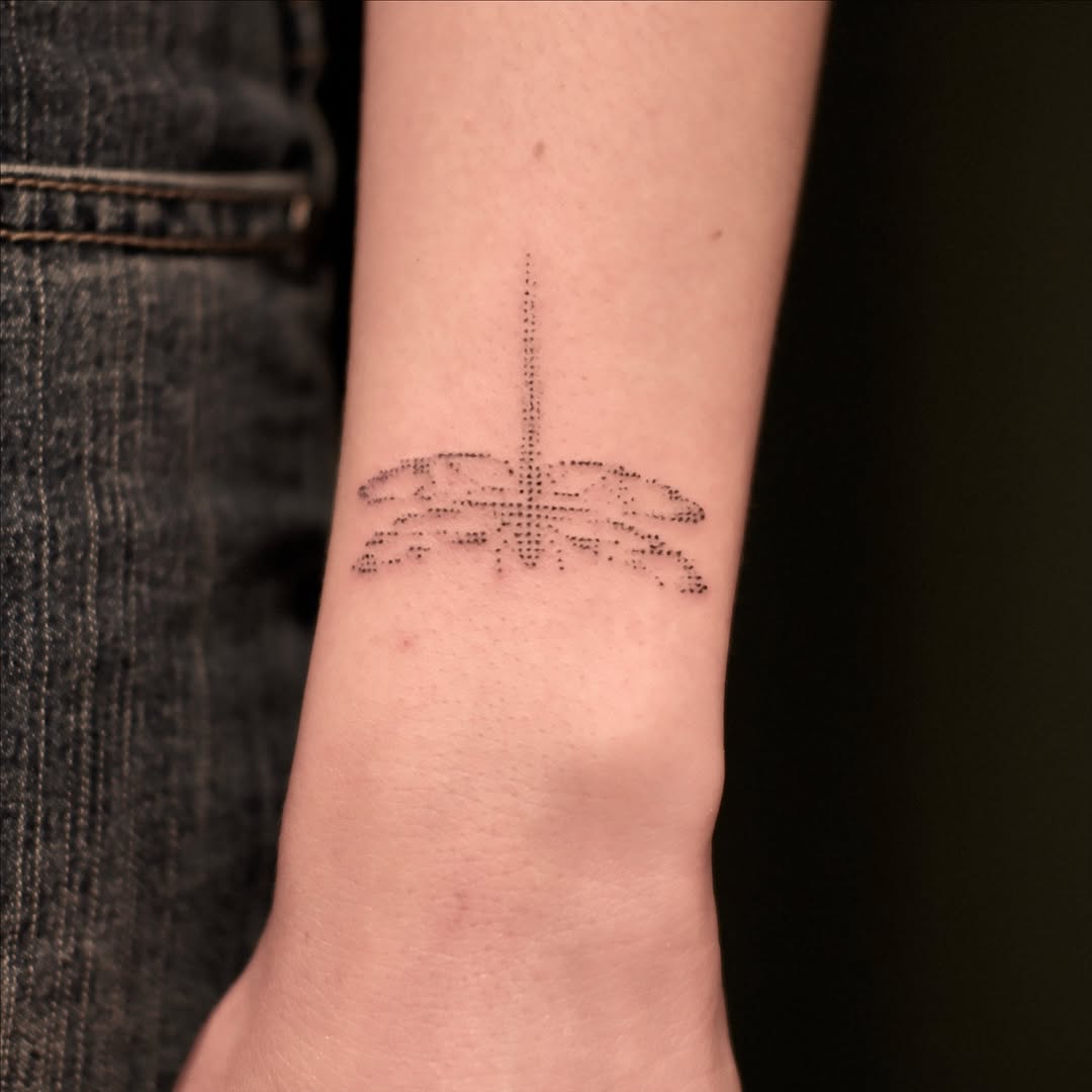Tattoo by @snappy.dots — dotwork, minimalist
