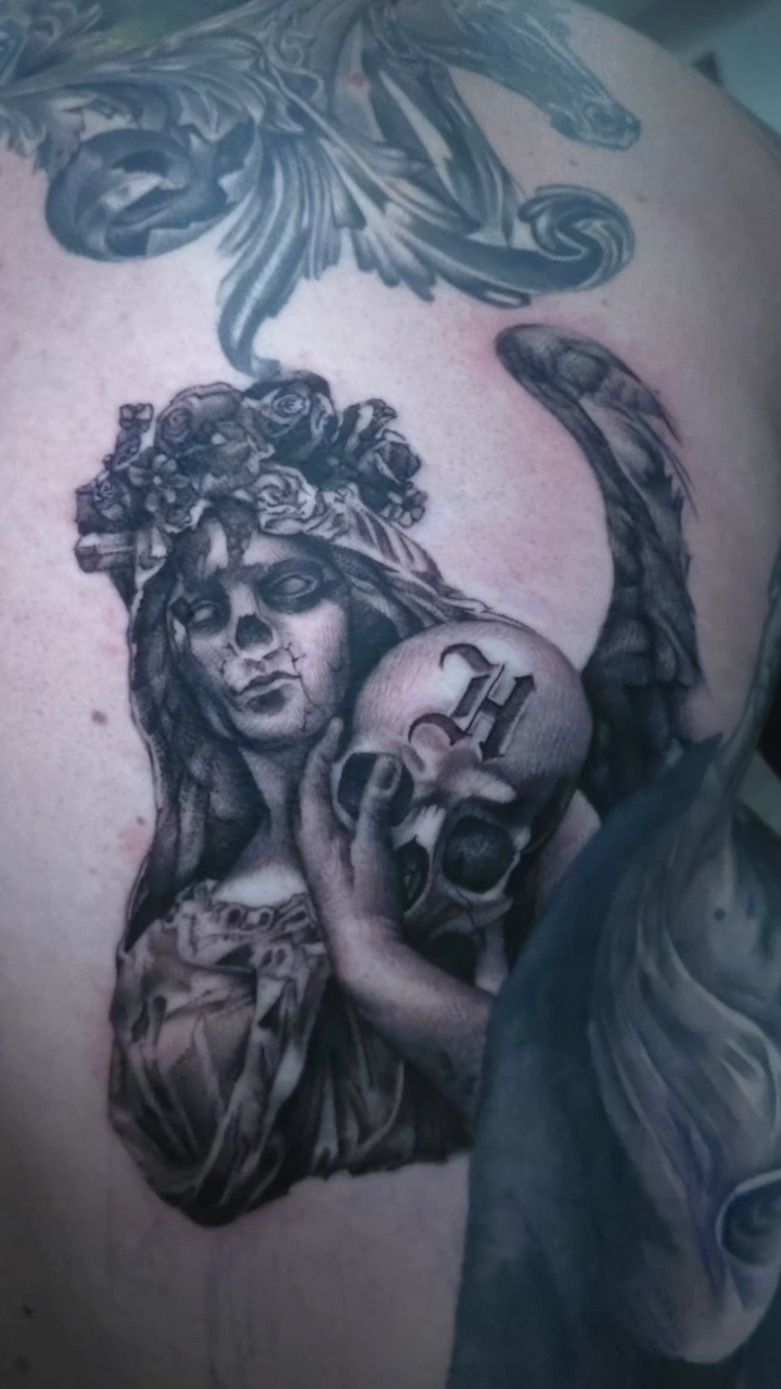 Tattoo by @tinyhandband — dark_realism, black_and_grey