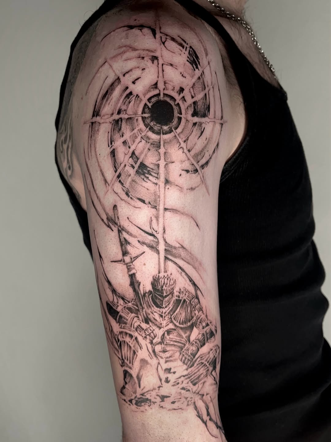 Tattoo by @rayzhu.tattoo — black_and_grey, dark_realism