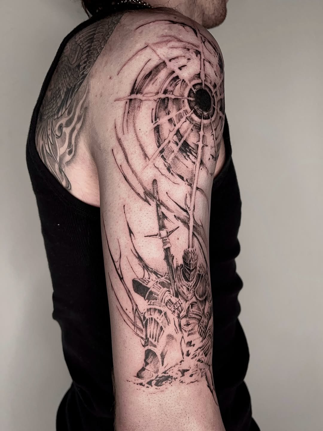 Tattoo by @rayzhu.tattoo — black_and_grey, dark_realism