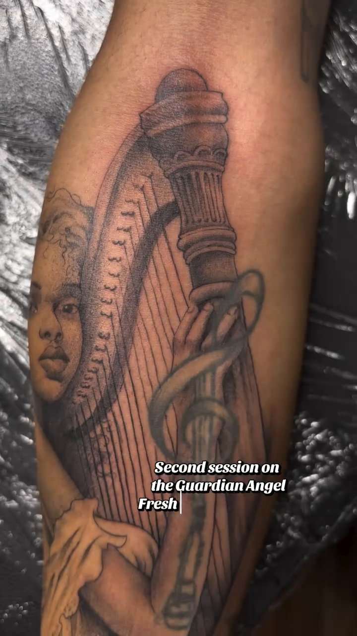 Tattoo by @inkby.lee โ realism, black_and_grey