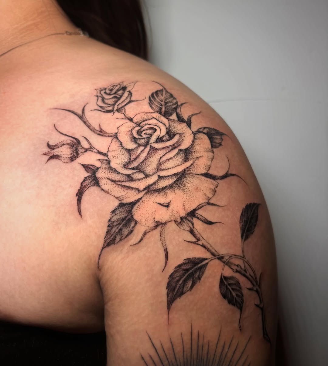Tattoo by @liz.tattooz — black_and_grey, dotwork