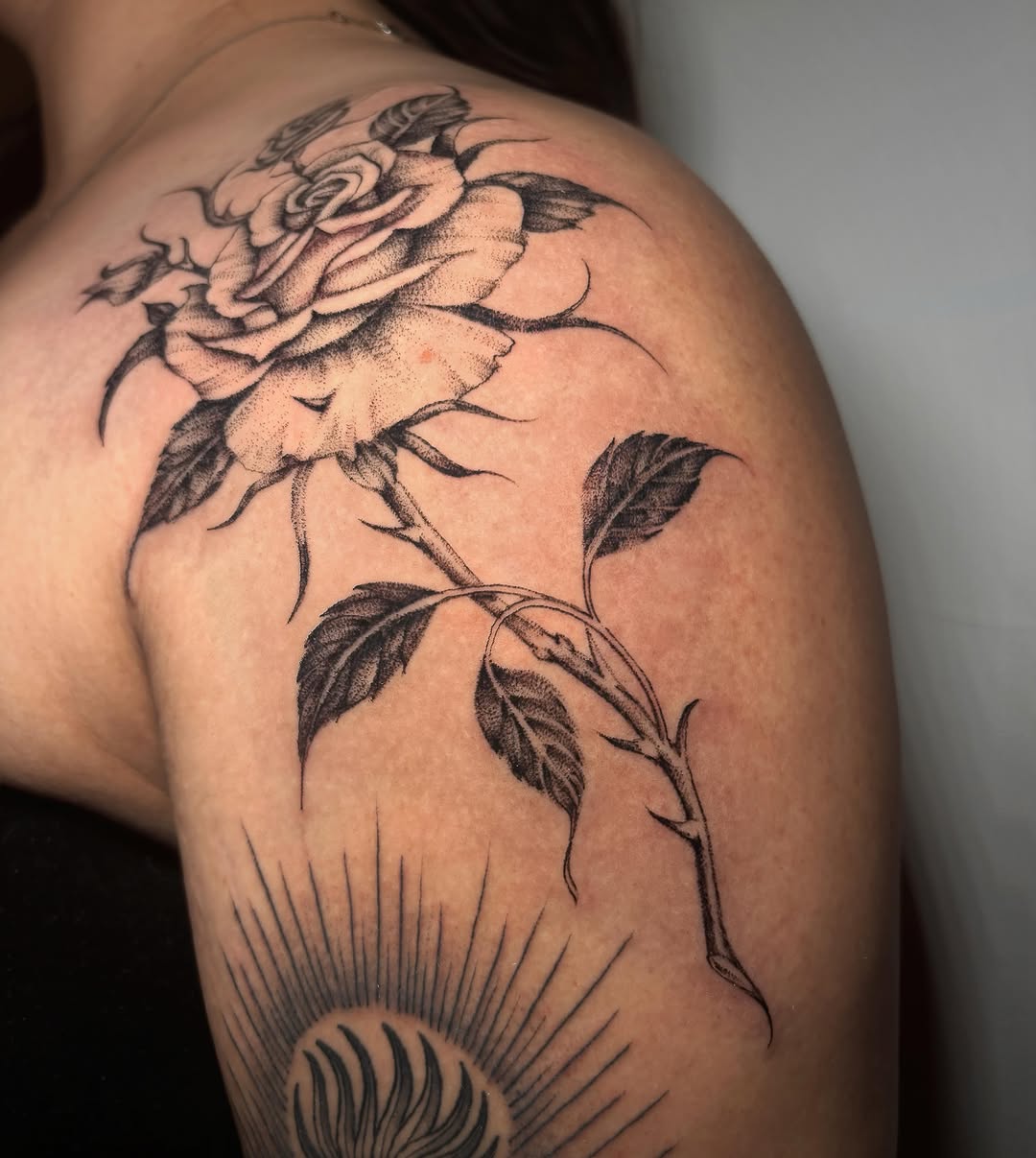 Tattoo by @liz.tattooz — black_and_grey, illustrative
