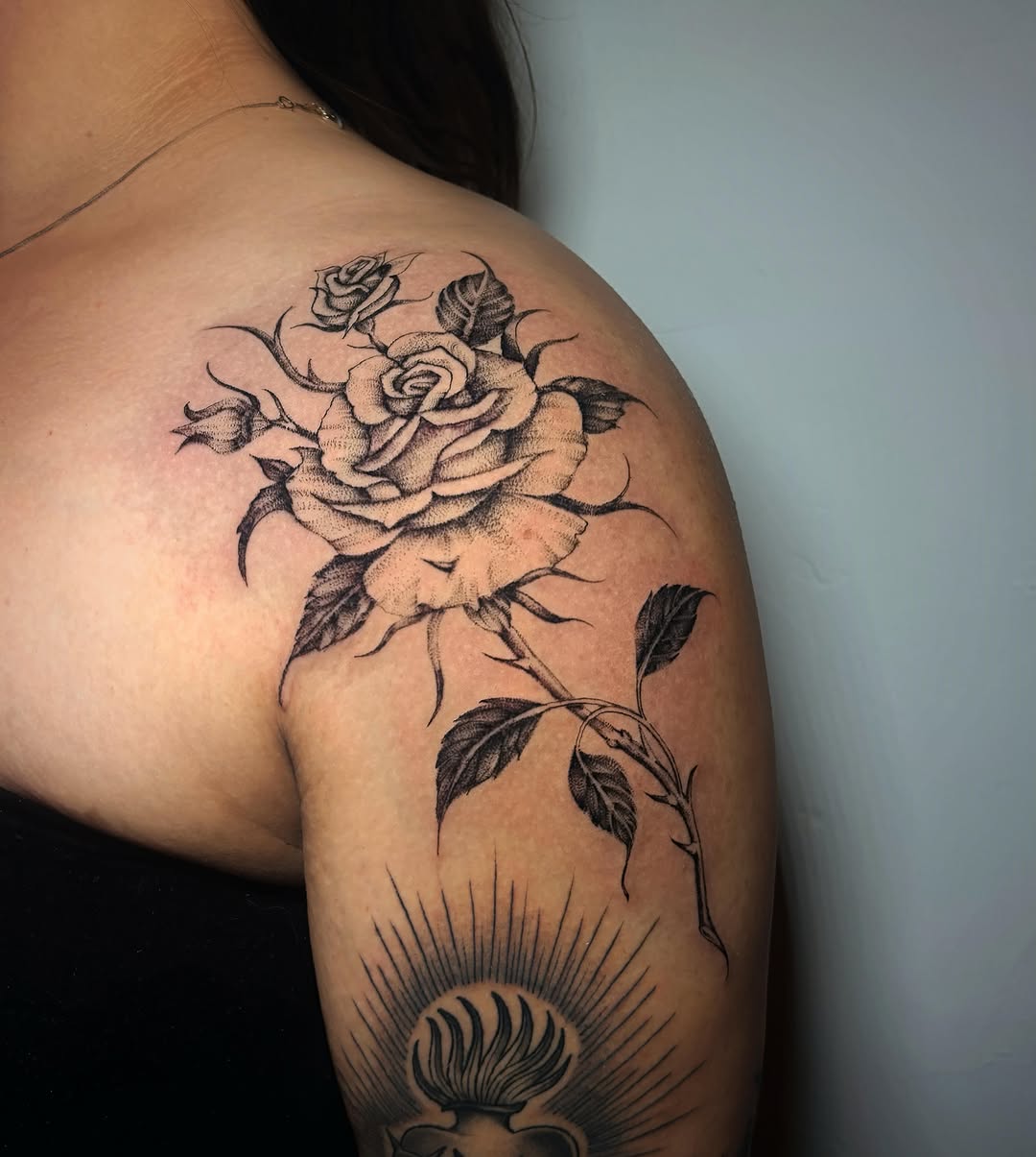 Tattoo by @liz.tattooz — black_and_grey, dotwork