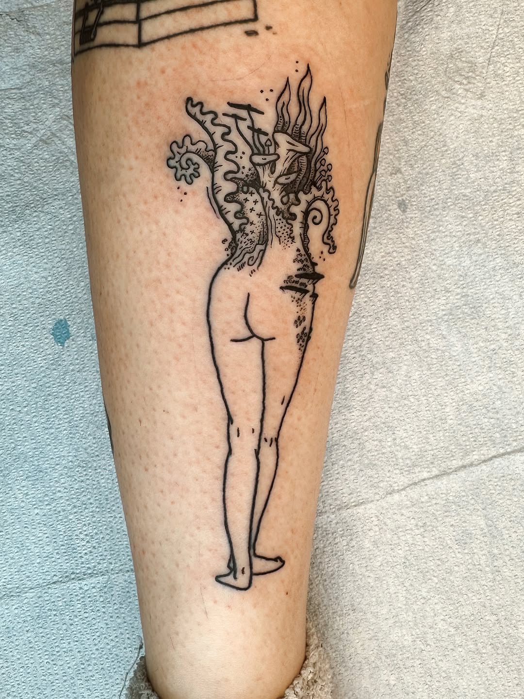 Tattoo by @flatrabbitstudio — illustrative, blackwork