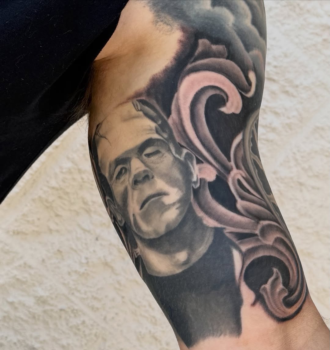 Tattoo by @sherick.tattoo — realism, black_and_grey