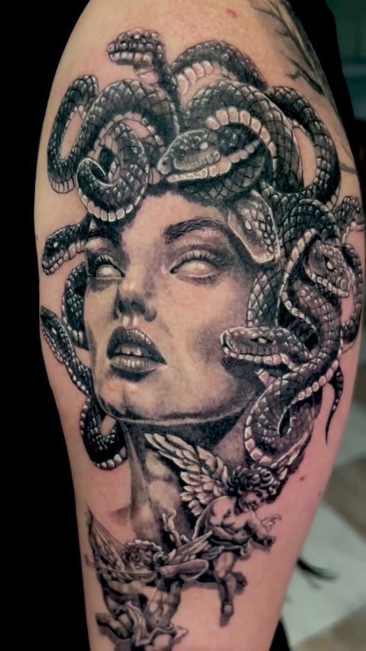 Tattoo by @molatutattoo — realism, black_and_grey