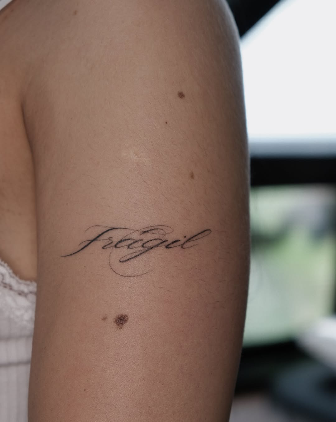 Tattoo by @corina.tattoo — lettering_script, fine_line