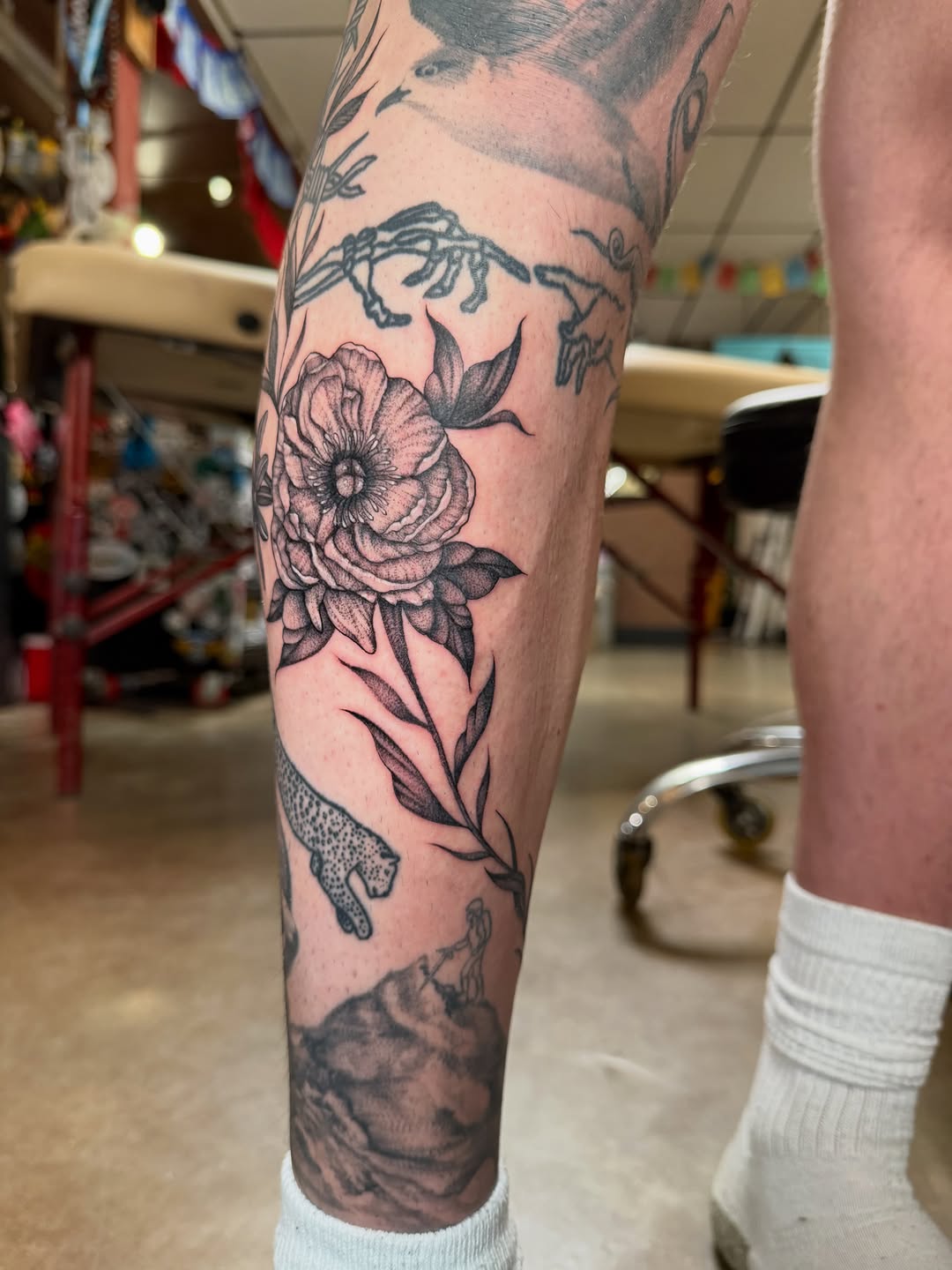Tattoo by @rosie.tattoo — black_and_grey, dotwork