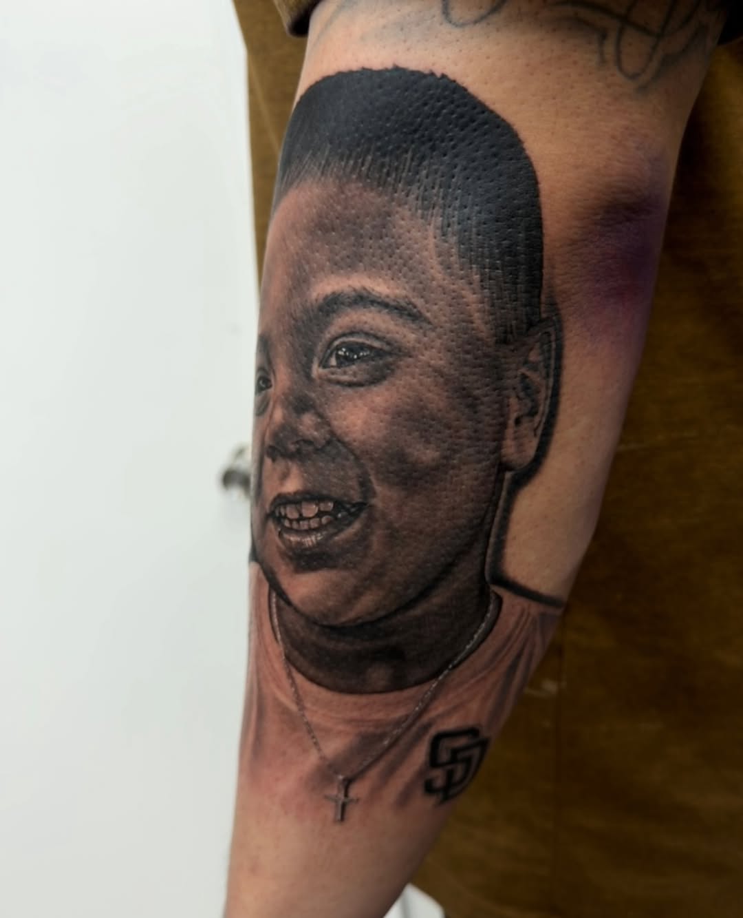 Tattoo by @richie_moreno_tattoo — realism, black_and_grey