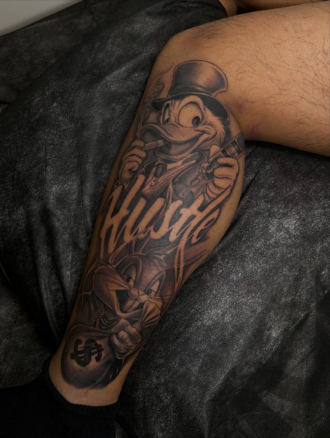 Tattoo by @mkv.ink — illustrative, black_and_grey